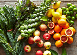 a group of fruits and vegetables on a wood surface Healthy Weight Loss Diets Nottinghamshire
